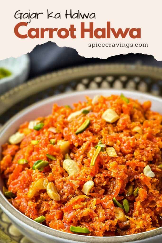 Carrot halwa in white bowl garnished with nuts