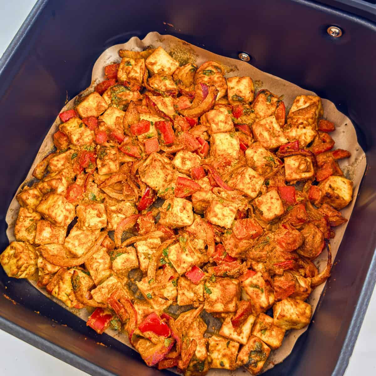 air fried tandoori paneer and veggies in air fryer basket