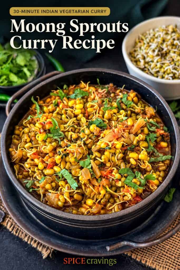 Vegetarian Moong Sprouts Curry in a black bowl with side dishes.